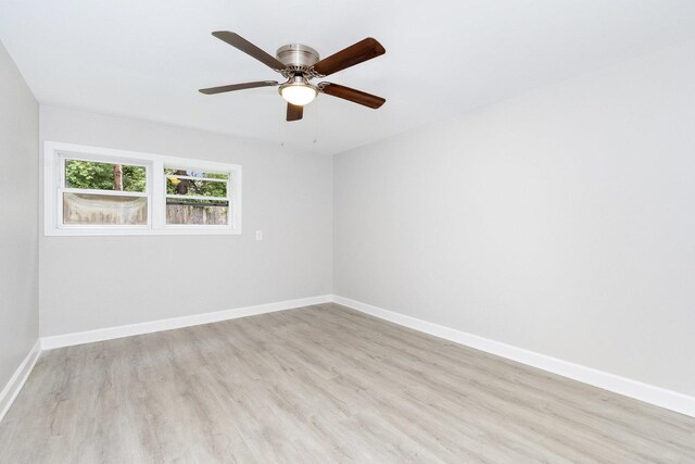 11S561 Saratoga Ave, Lemont, IL 60439 - unfurnished room with light wood-type flooring, baseboards, and a ceiling fan
