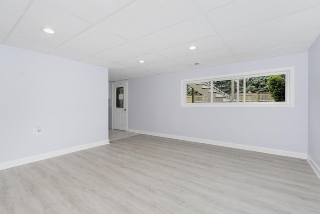 11S561 Saratoga Ave, Lemont, IL 60439 - unfurnished room featuring a paneled ceiling, baseboards, wood finished floors, and recessed lighting