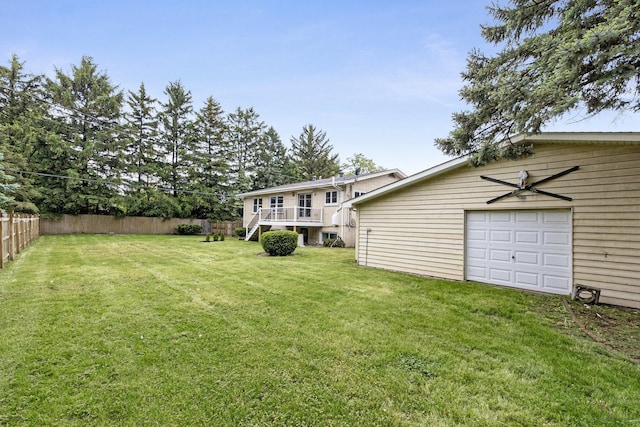 11S561 Saratoga Ave, Lemont, IL 60439 - view of yard with a deck, an outbuilding, and a garage