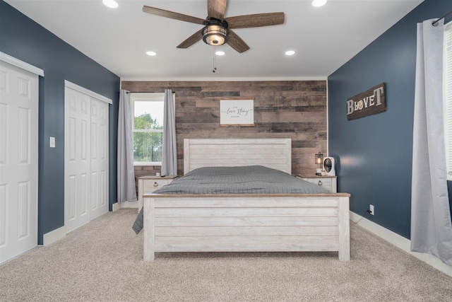 17469 N 300 E Rd, Flanagan, IL 61740 - bedroom with carpet flooring, recessed lighting, baseboards, two closets, and wooden walls