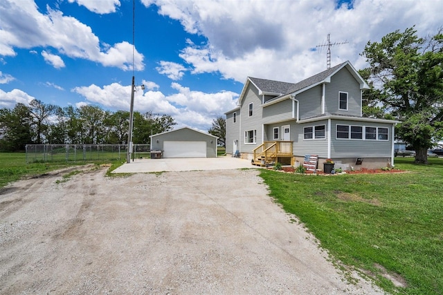 17469 N 300 E Rd, Flanagan, IL 61740 - view of front facade with an outbuilding and a detached garage