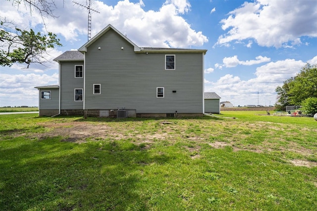 17469 N 300 E Rd, Flanagan, IL 61740 - back of property with a lawn and central air condition unit