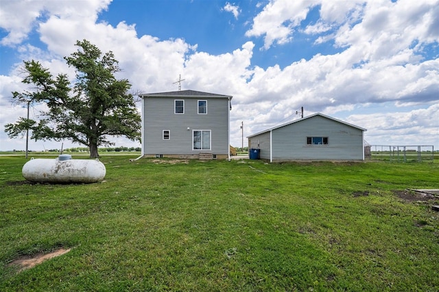 17469 N 300 E Rd, Flanagan, IL 61740 - rear view of house featuring a lawn