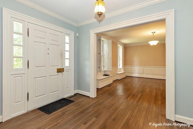 21293 N Andover Rd, Kildeer, IL 60047 - foyer entrance with dark wood-style floors, healthy amount of natural light, crown molding, and wainscoting