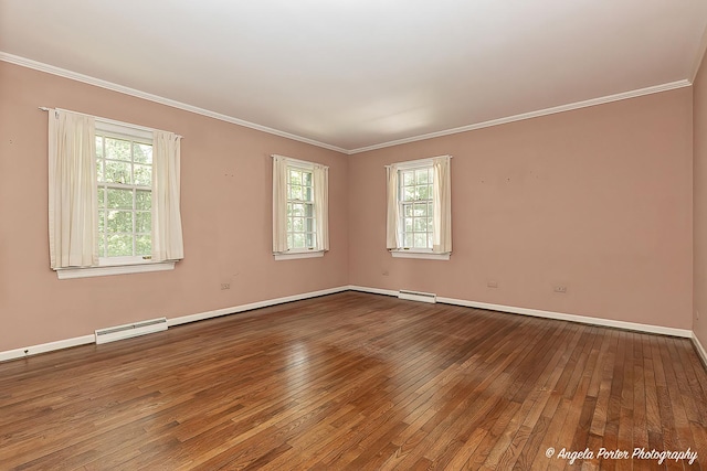 21293 N Andover Rd, Kildeer, IL 60047 - spare room featuring hardwood / wood-style floors, ornamental molding, and healthy amount of natural light