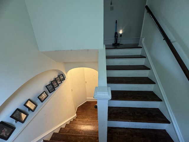 1309 S Main St, Bloomington, IL 61701 - stairs with wood finished floors and arched walkways