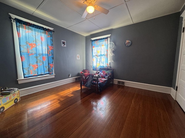 1309 S Main St, Bloomington, IL 61701 - sitting room featuring wood finished floors, ceiling fan, and baseboards