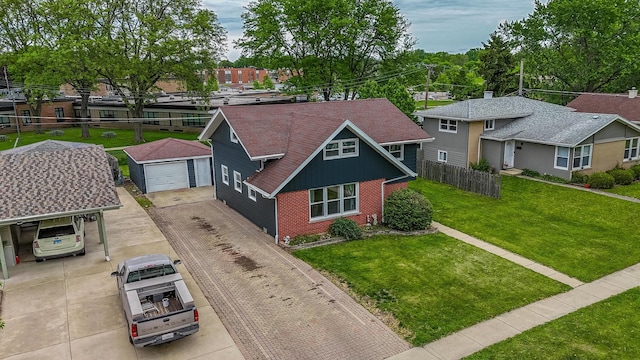 205 Glen St, West Chicago, IL 60185 - view of front of property featuring brick siding and a garage