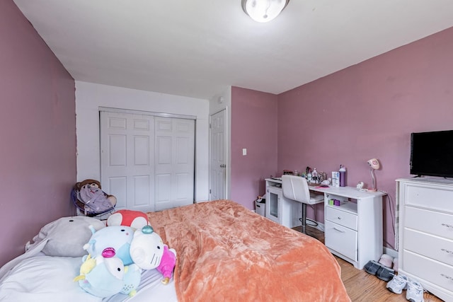 205 Glen St, West Chicago, IL 60185 - bedroom featuring a closet and light wood-style flooring