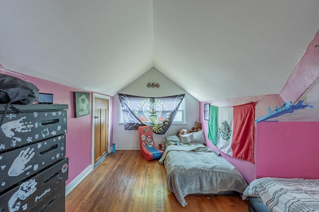 205 Glen St, West Chicago, IL 60185 - bedroom with wood finished floors, vaulted ceiling, and baseboards