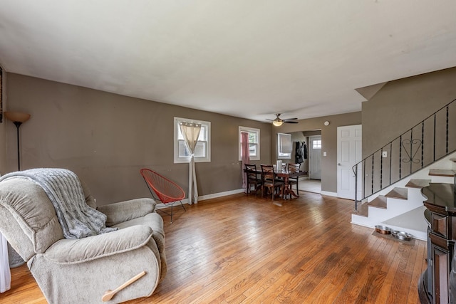 205 Glen St, West Chicago, IL 60185 - living area with plenty of natural light, stairway, light wood finished floors, and baseboards