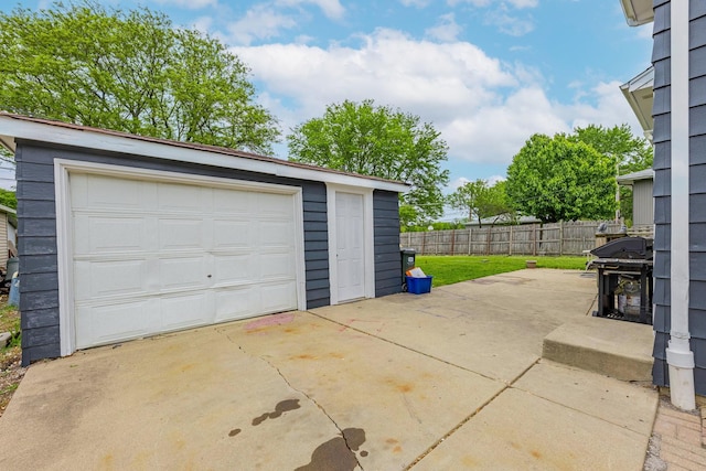 205 Glen St, West Chicago, IL 60185 - detached garage featuring concrete driveway