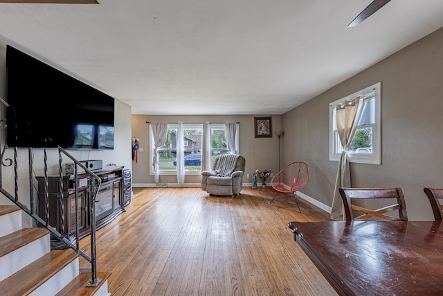 205 Glen St, West Chicago, IL 60185 - living area featuring wood-type flooring, baseboards, and stairway
