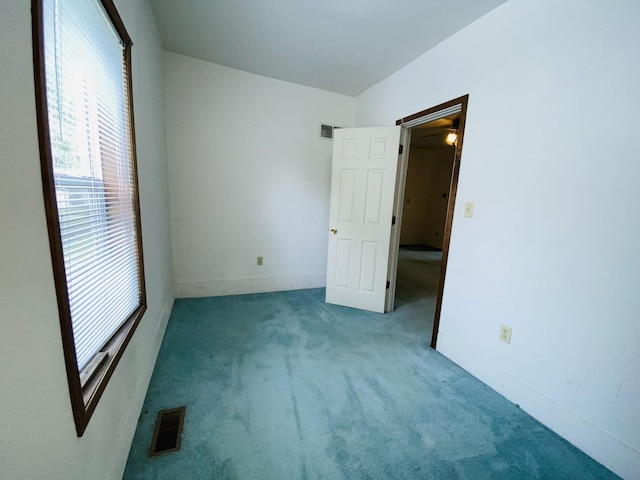 807 W Washington St, Pontiac, IL 61764 - unfurnished bedroom with carpet flooring and baseboards