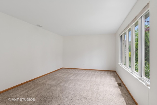 5203 Brighton Ln, Plainfield, IL 60586 - carpeted spare room with baseboards