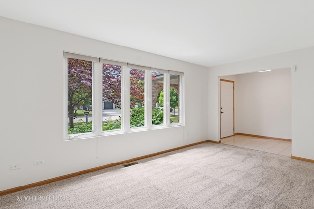 5203 Brighton Ln, Plainfield, IL 60586 - carpeted empty room with baseboards