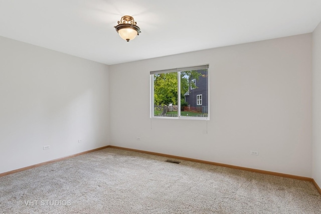 5203 Brighton Ln, Plainfield, IL 60586 - carpeted empty room with baseboards