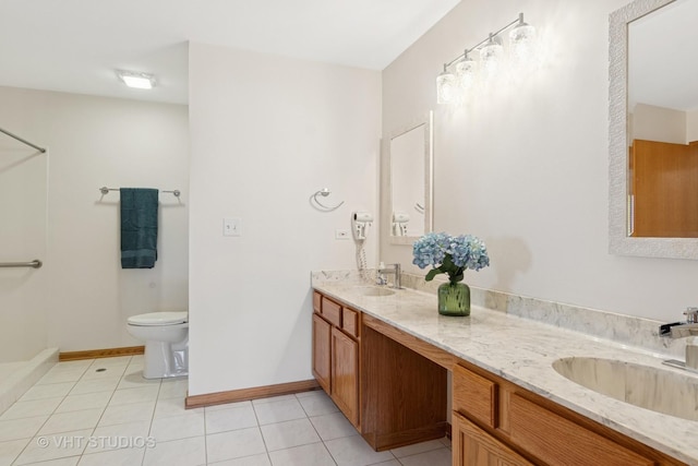 5203 Brighton Ln, Plainfield, IL 60586 - full bathroom featuring tile patterned flooring, double vanity, toilet, and baseboards