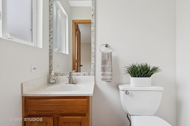 5203 Brighton Ln, Plainfield, IL 60586 - half bathroom featuring vanity and toilet