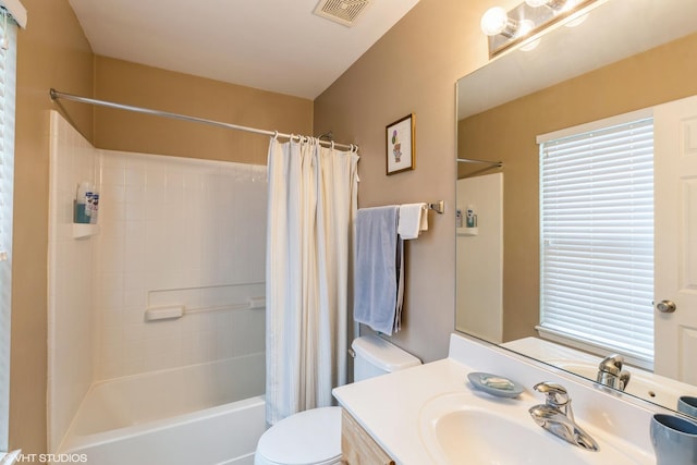 1532 Legacy Dr Unit 3, Dekalb, IL 60115 - full bath featuring vanity, shower / tub combo with curtain, and toilet