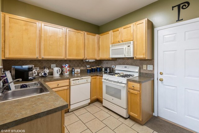 1532 Legacy Dr Unit 3, Dekalb, IL 60115 - kitchen with white appliances, a sink, light brown cabinets, and backsplash