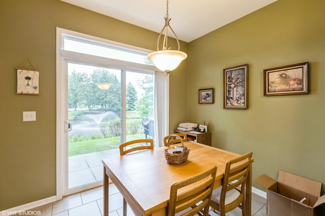 1532 Legacy Dr Unit 3, Dekalb, IL 60115 - dining room featuring light tile patterned floors and baseboards