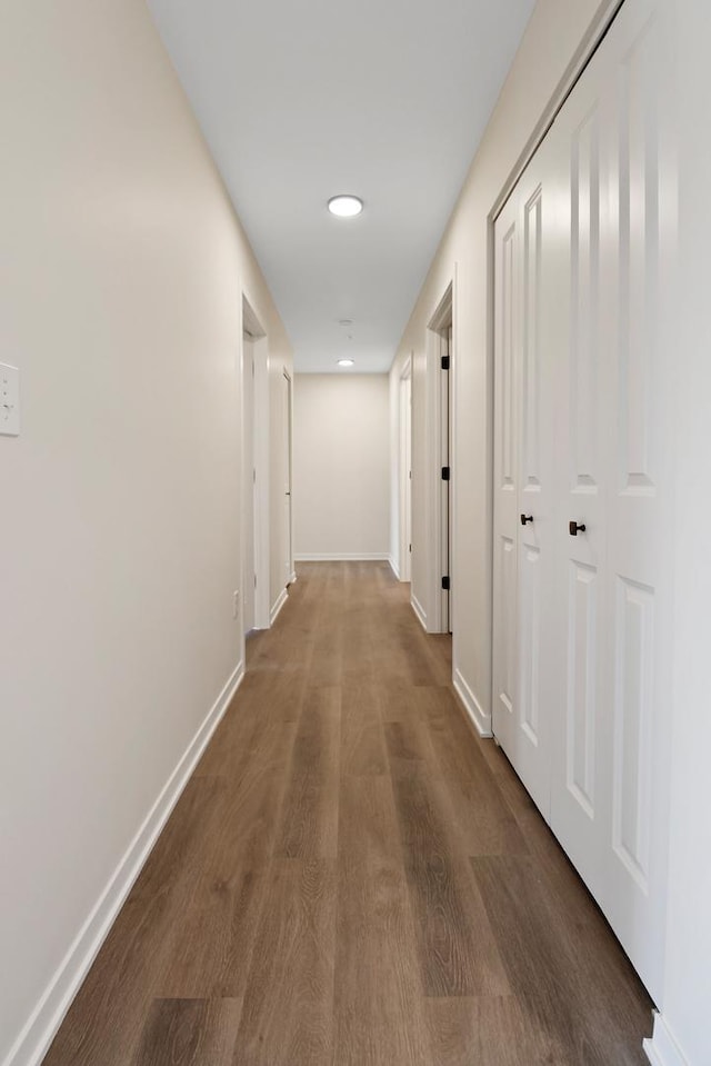 2034 W 75th Pl Unit 32, Merrillville, IN 46410 - corridor with wood finished floors, baseboards, and recessed lighting