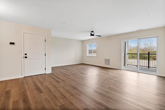 2034 W 75th Pl Unit 32, Merrillville, IN 46410 - spare room with ceiling fan, wood finished floors, and healthy amount of natural light