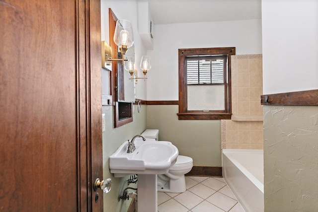 610 S 3rd St, Dekalb, IL 60115 - full bathroom featuring tile patterned floors and a bath