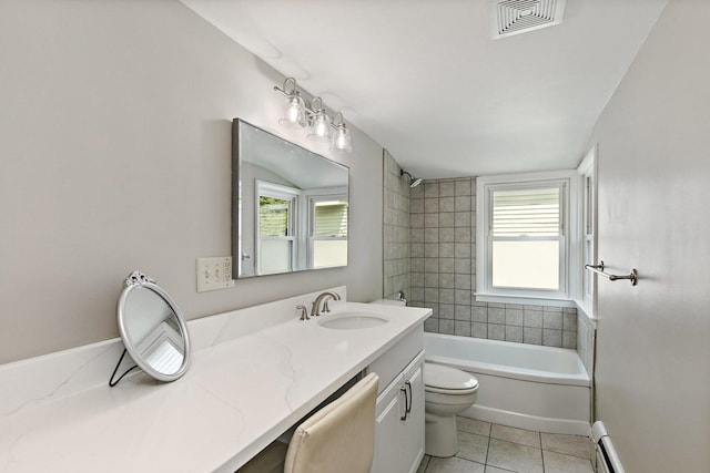 610 S 3rd St, Dekalb, IL 60115 - full bath featuring vanity, plenty of natural light, tile patterned floors, and washtub / shower combination