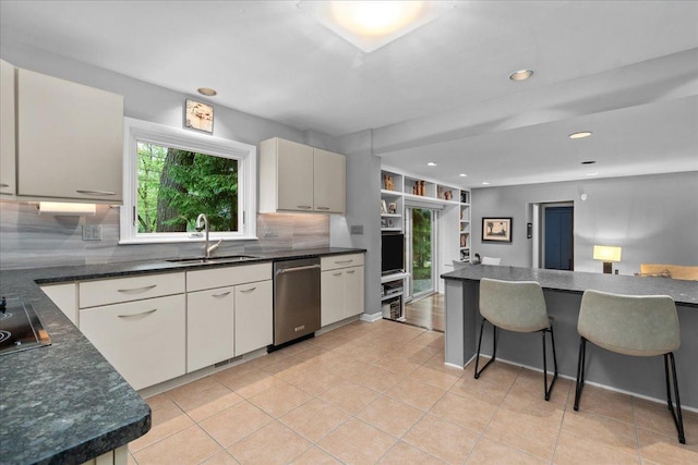 185 Carlisle Ave, Deerfield, IL 60015 - kitchen with dishwasher, a sink, decorative backsplash, light tile patterned floors, and black electric stovetop