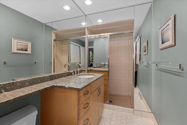 185 Carlisle Ave, Deerfield, IL 60015 - bathroom with a shower stall, recessed lighting, toilet, vanity, and tile patterned floors