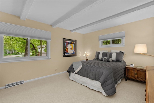 185 Carlisle Ave, Deerfield, IL 60015 - carpeted bedroom featuring beamed ceiling, multiple windows, and baseboards