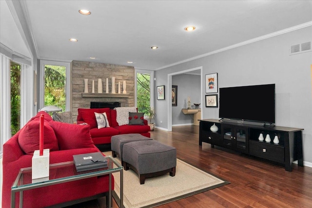 185 Carlisle Ave, Deerfield, IL 60015 - living area featuring ornamental molding, wood finished floors, baseboards, a stone fireplace, and recessed lighting