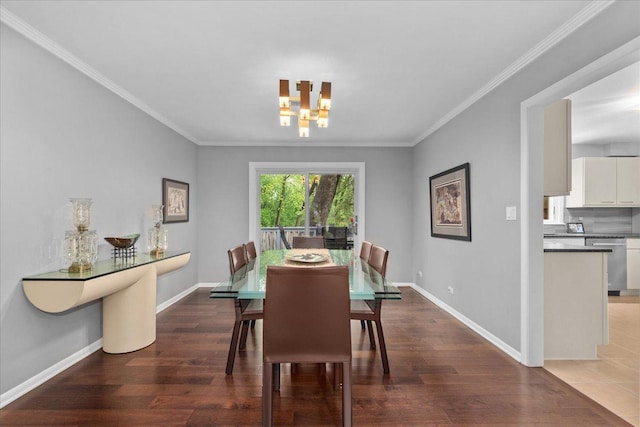 185 Carlisle Ave, Deerfield, IL 60015 - dining space with a chandelier, crown molding, baseboards, and wood finished floors