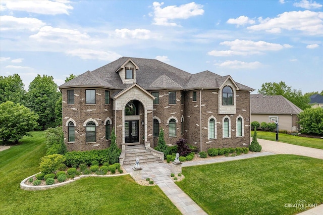 4748 Sassafras Ln, Naperville, IL 60564 - french country home featuring brick siding, a front lawn, and french doors