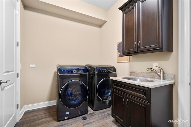4748 Sassafras Ln, Naperville, IL 60564 - washroom featuring cabinet space, wood finished floors, separate washer and dryer, and baseboards