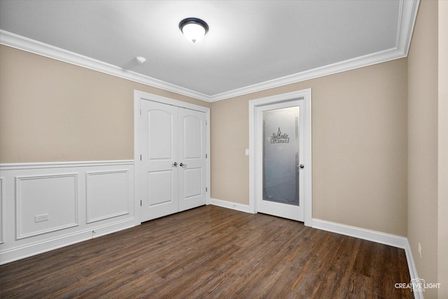 4748 Sassafras Ln, Naperville, IL 60564 - unfurnished bedroom with dark wood-style flooring, ornamental molding, a closet, and baseboards