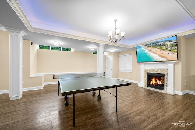 4748 Sassafras Ln, Naperville, IL 60564 - game room featuring ornate columns, a raised ceiling, wood finished floors, and ornamental molding