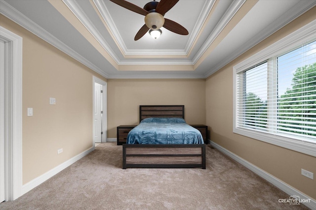 4748 Sassafras Ln, Naperville, IL 60564 - carpeted bedroom featuring a tray ceiling, ornamental molding, baseboards, and a ceiling fan