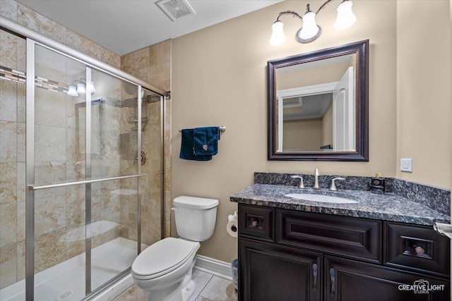 4748 Sassafras Ln, Naperville, IL 60564 - bathroom featuring toilet, vanity, a shower stall, baseboards, and tile patterned flooring