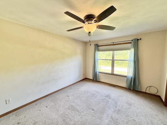 2123 Maxine Ln, Rockford, IL 61102 - unfurnished room featuring carpet flooring and ceiling fan