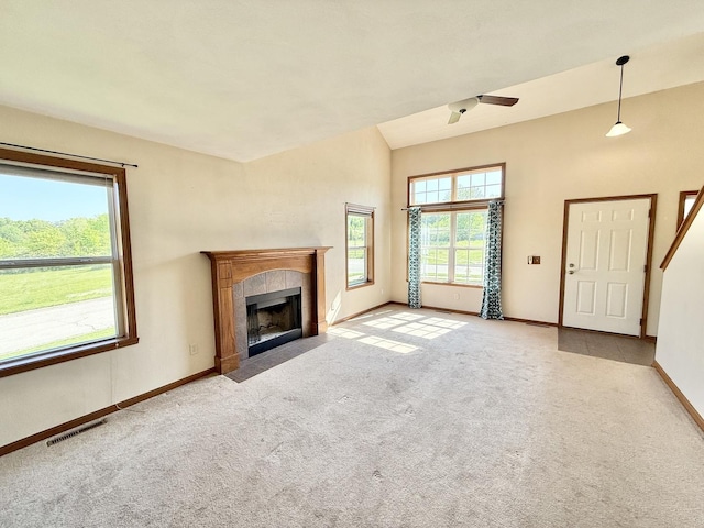 2123 Maxine Ln, Rockford, IL 61102 - unfurnished living room featuring carpet flooring, a ceiling fan, and a fireplace