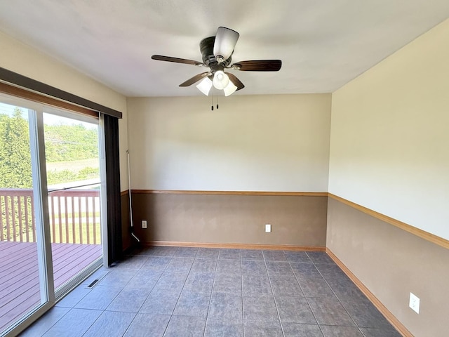 2123 Maxine Ln, Rockford, IL 61102 - empty room with ceiling fan and tile patterned floors