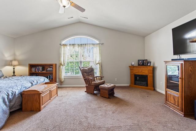 3807 Sandstone Dr, Champaign, IL 61822 - bedroom with carpet flooring, a glass covered fireplace, baseboards, vaulted ceiling, and a ceiling fan