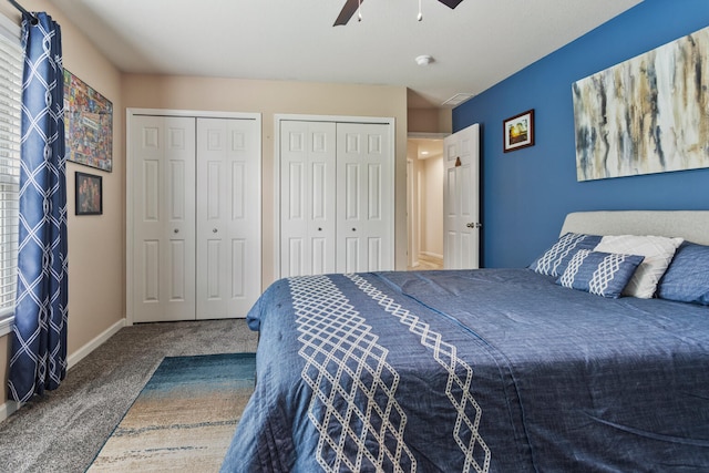 3807 Sandstone Dr, Champaign, IL 61822 - bedroom featuring carpet, two closets, ceiling fan, and baseboards