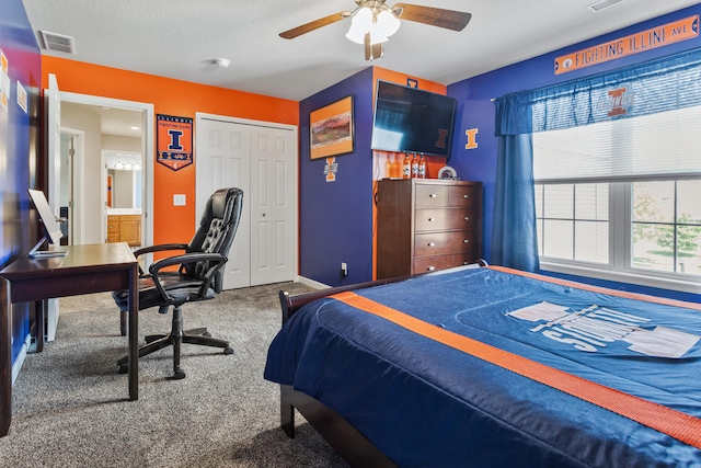 3807 Sandstone Dr, Champaign, IL 61822 - bedroom featuring carpet flooring, a desk, baseboards, a ceiling fan, and a closet