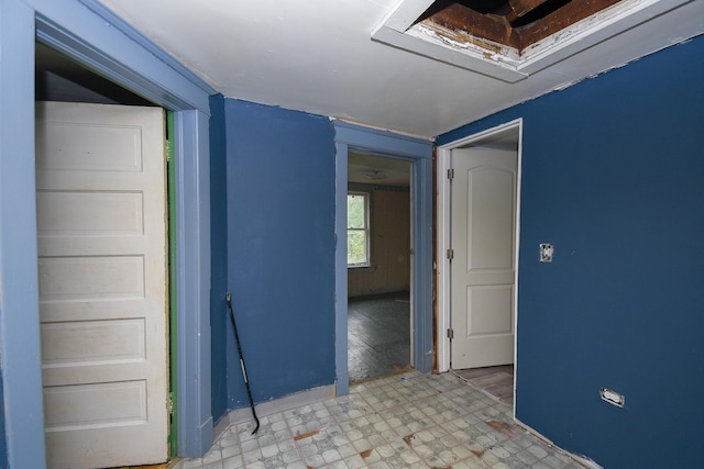 937 N County St, Waukegan, IL 60085 - spare room with light flooring and baseboards