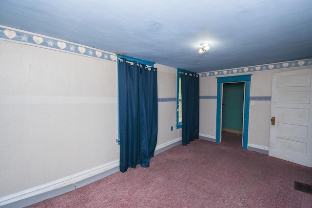 937 N County St, Waukegan, IL 60085 - unfurnished bedroom with carpet flooring and baseboards