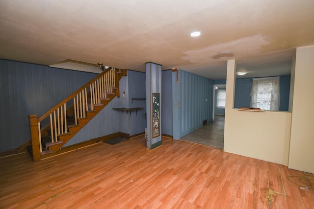 937 N County St, Waukegan, IL 60085 - unfurnished living room featuring wood finished floors and stairway